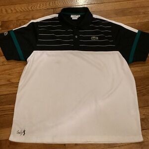 Vintage Lacoste Pole Shirt solid White bottom striped top with a Lacoste logo